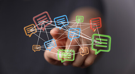Abstract concept of social network, digital communication, and online connections with hand touching message bubbles.