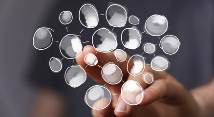 Hand interacting with a digital network, showcasing connection, collaboration, and growth.