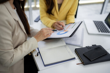 Adult Asian Businesswomen Hands Analyze Financial Reports Discuss Data Strategy Office Meeting Collaborative Business Partner Discussion