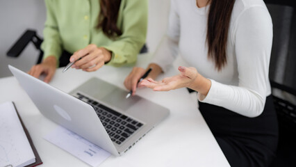Professionals collaborating office workspace discuss project analyze data sharing ideas plan strategy solve business challenges review report