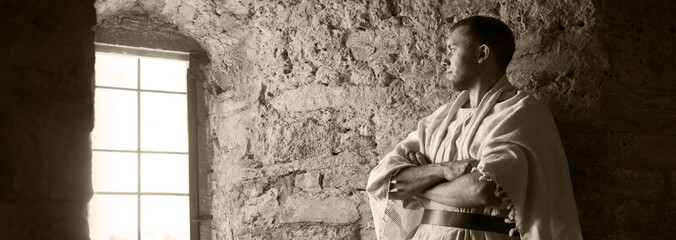 Ancient man at the window