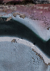 cracked and peeling paint on a wall surface. The weathered texture shows layers of faded blue and white paint flaking off, revealing an aged and distressed background. Perfect as a grunge overlay.