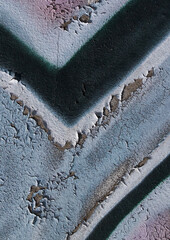 cracked and peeling paint on a wall surface. The weathered texture shows layers of faded blue and white paint flaking off, revealing an aged and distressed background. Perfect as a grunge overlay.
