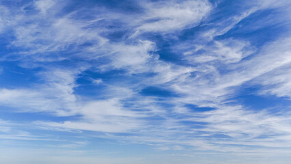 Fototapeta premium Cirrus clouds blue sky with clouds background aerial drone photography