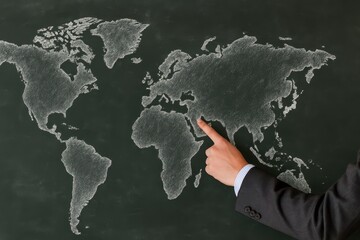 Global business strategy presentation office chalkboard map professional environment close-up view