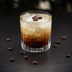 
Layered iced coffee cocktail or mixed drink in a ribbed glass, garnished with coffee beans, set on a dark, rich background. Perfect for bar, caffee, and beverage stock photos.