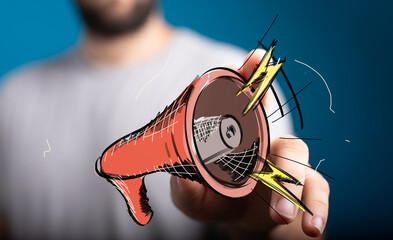 Image of a hand holding a megaphone, symbolizing announcement, news, marketing, communication, and...