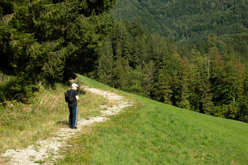 Man Walking on Forest Path in Harmony with Nature