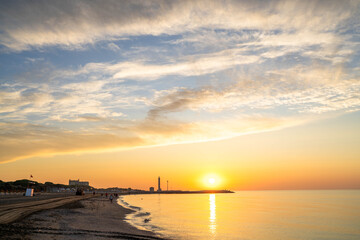 Sunrise in Ca'Savio Italy on the Aegean Sea Near Venice with A Lighthouse in the Distance