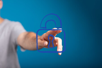 A hand touches a virtual padlock icon, symbolizing digital security, data protection, privacy, and safe online access. Ideal for cybersecurity c