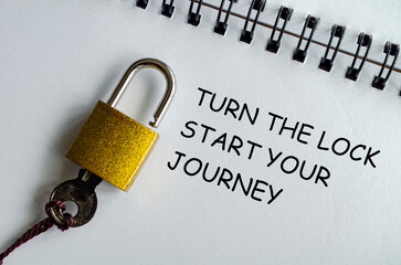 TURN THE LOCK, START YOUR JOURNEY, Motivational notepad with padlock and key symbolizing first...