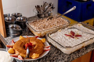 Dessert table with pudding and Crustless Banana Meringue Pie