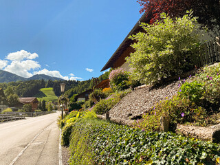 Traditional European Village with Charming Houses in Mountain Nature