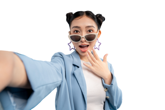 Portrait young Asian woman taking selfie and looking shocked. She wearing sunglasses with star shape earring on PNG - Powered by Adobe