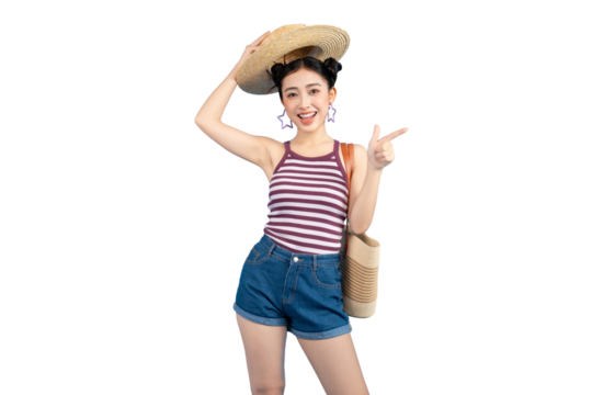 A young woman poses gracefully in a casual outfit, ready for a sunny day out, with a straw hat and a charming smile