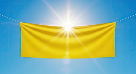 A yellow banner with a sun shining through it against a blue sky.