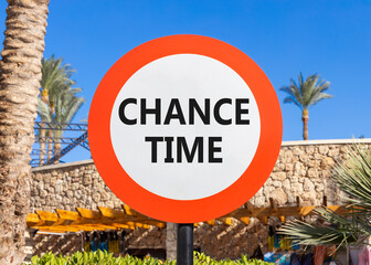 Chance time symbol. Concept word Chance time on beautiful red and white road sign. Beautiful palm...