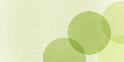 緑色の和紙に描かれた円形のやさしい幾何学的な背景