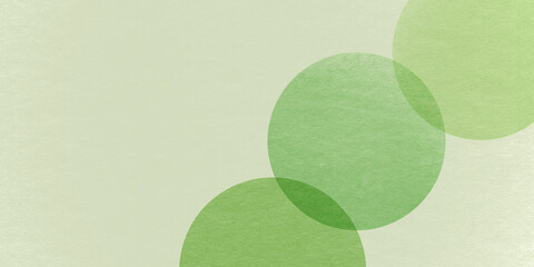 緑色の和紙に描かれた円形のやさしい幾何学的な背景