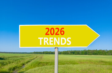 2026 Trends new year symbol. Concept words 2026 Trends on beautiful yellow road sign. Beautiful green grass field forest and blue sky background. Business and 2026 Trends new year concept. Copy space.