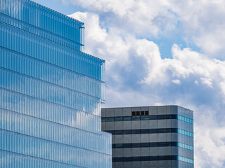 Buildings reflect the sky in a modern cityscape of Sweden on a cloudy day