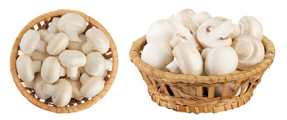 Fresh mushroom champignon in a wicker basket isolated on white background. Top view. Flat lay