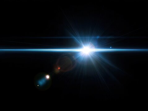 A bright white light source shines with blue rays and lens flares against a black backdrop