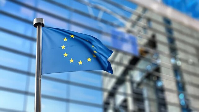 European Union flag waving on building background