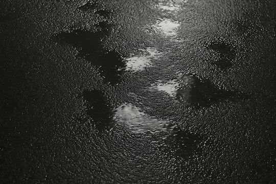 Glossy wet asphalt road texture