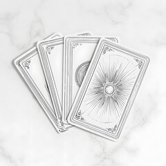 Four tarot cards are fanned out on a white marble surface. The cards display intricate black and white designs. The background is a bright, clean, and neutral backdrop.