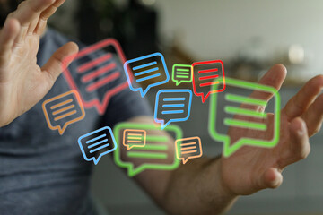 Digital communication concept. Human hands interacting with colorful glowing digital speech bubbles. Symbolic of connection and conversations.