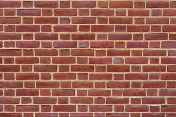 Brick brickwall, vintage texture. Red brick wall for construction themes. Brick wall background. Textured bricks for design projects. Solid bricks, wall structure close-up. Brick wall pattern.