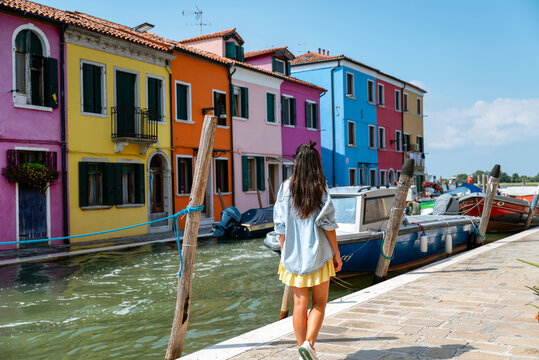 Fototapeta Beautiful traveler woman on the street in Burano ,Italy