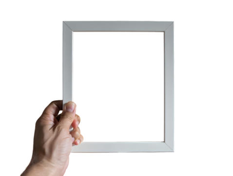 Human hand holding a white square frame containing a vibrant red color block isolated on a transparent background