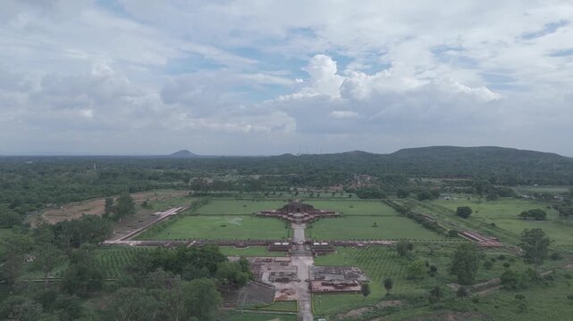 Aerial drone view of Vikramshila University ruins in Bihar, India. Ancient Buddhist learning center showcasing symmetrical monastery layout, historic architecture, and archaeological heritage from abo