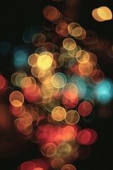 Abstract circles of golden, red, and teal light create bokeh effect.