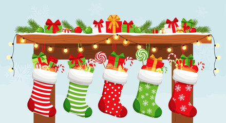 Christmas Stockings Filled With Gifts and Candy on a Mantle Decorated for the Holidays
