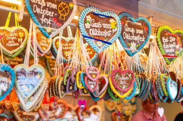Munich, Germany - October 3rd 2025: Lebkuchen hearts reading “Gruß vom Oktoberfest” (Bavarian: “Greetings from Oktoberfest”) — gingerbread hearts at Oktoberfest 2025