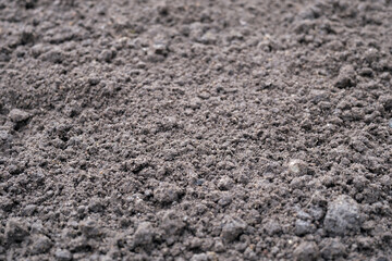 Dark brown soil preparing for planting season background