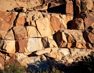 Close-up of layered, sunlit geological rock formation
