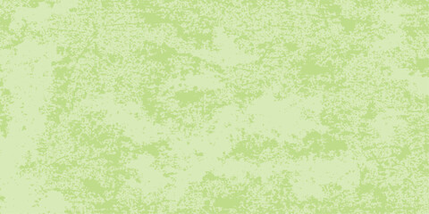 Fototapeta premium A light green grunge background with a dirty and aged paper texture for a vintage parchment design