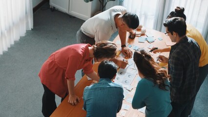 Top view of smart designer team writing comment to develop product. Professional business people...