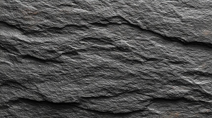 Natural black stone texture with subtle surface variations, creating a dark, organic background that feels grounded, timeless, and ideal for minimalist or dramatic design use.
