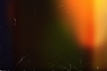 Light overlay, orange warm color. Blurry spots. Old film light leak texture with scratches, grain, noise and dust. Perfect as background or overlay for photo editing, video design, and digital art.