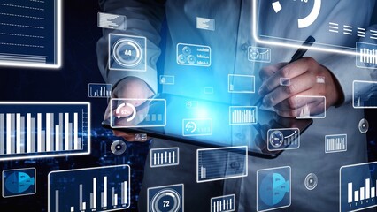This image showcases a professional analyzing data with futuristic graphs and user interfaces. The visual represents innovative technology in data analysis and statistics for business strategy. Xenic