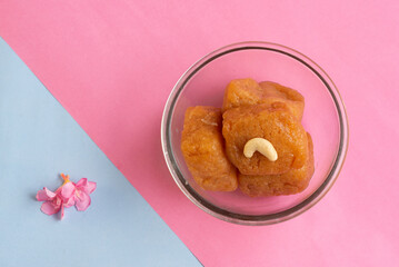 Balushahi, a popular North Indian sweet, is made from refined flour deep-fried in ghee and soaked in sugar syrup. Crispy outside and soft inside, it’s a festive delicacy enjoyed during weddings and fe