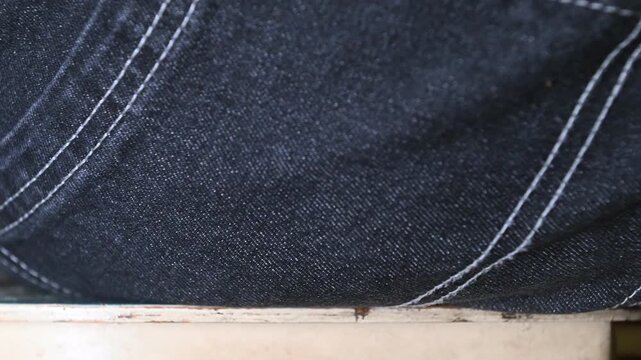 Crushing a walnut under the thigh