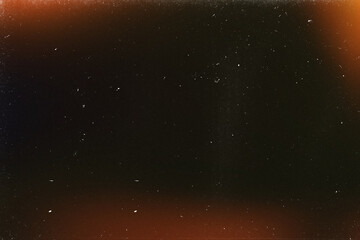 Light overlay, orange warm color. Blurry spots. Old film light leak texture with scratches, grain, noise and dust. Perfect as background or overlay for photo editing, video design, and digital art.