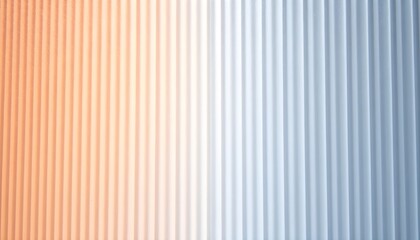 Obraz premium Abstract background with a vertical ribbed texture transitioning from warm orange to cool blue tones, creating a soft gradient effect.
