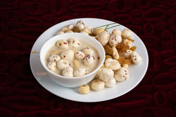 Makhana Kheer is a traditional Indian dessert made with fox nuts, milk, sugar, and dry fruits. Popular in Bihar, it’s a nutritious, creamy dish often prepared during festivals and fasting rituals.